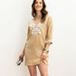 Casablanca Embroidered Tunic in color Starfish on a model