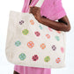 Pinwheel Tote Bag in color Cream on a model