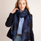 Flower Burst Sustainable Wrap in color Navy on a model