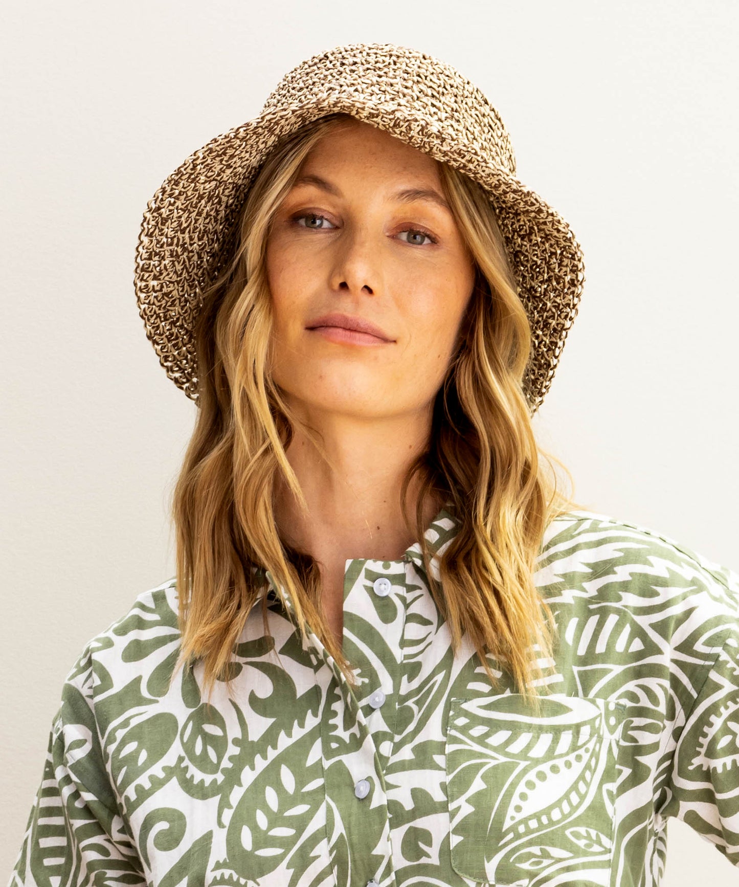 Marled Bucket Hat in color Natural on a model