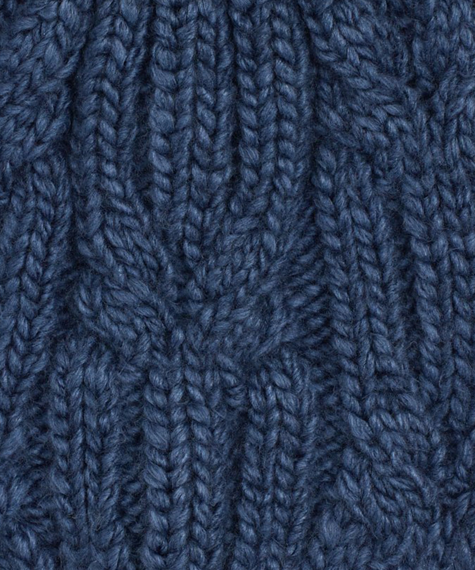 Twisted Cable Pom Hat in color Denim Blue