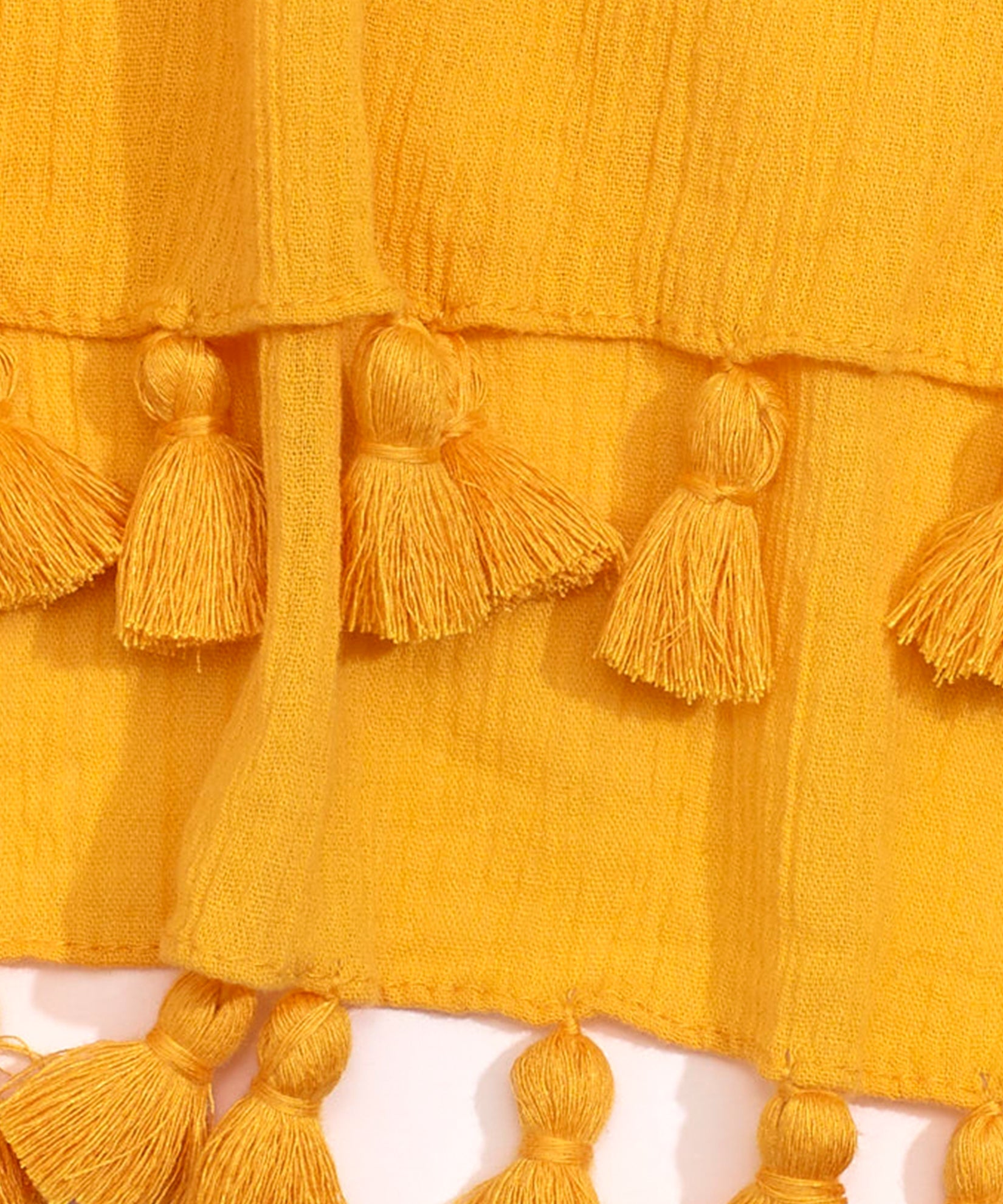 Solid Crinkle Tassel Wrap in color Mango